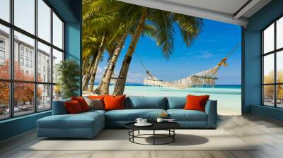 Tropical landscape: beautiful beach with hammock and tropical sea. Panglao island, Bohol, Philippines. Summer and travel vacation concept. Wall mural