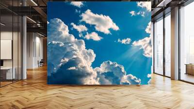 Blue sky with cumulus clouds and sun background. Concept nature and weather backgrounds. Environment, atmosphere. Copy space Wall mural