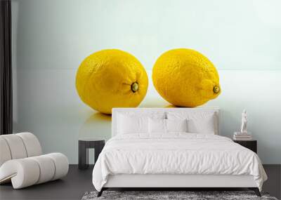 Yellow lemons on white background Wall mural