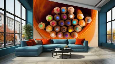 matite colorate dentro porta penne arancione Wall mural