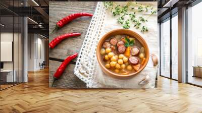 Soup with chickpeas and smoked sausage Wall mural