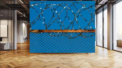 Fence with barbed wire Wall mural