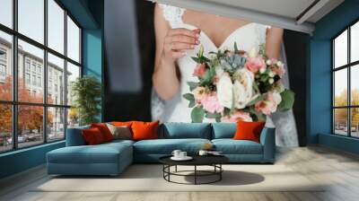 bride holding a bouquet of flowers in a rustic style, wedding bouquet. Soft focus Wall mural