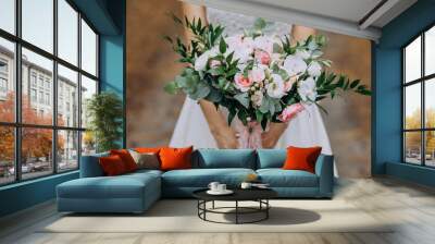 bride holding a bouquet of flowers in a rustic style, wedding bouquet. Soft focus Wall mural