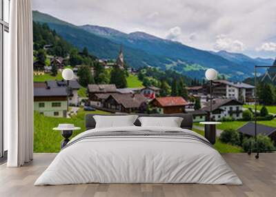  Beautiful village of Heiligenblut in valley among high mountains. Not far from highest mountain Grossglockner and famous grossglockner high alpine road. Austria Wall mural