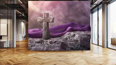 Ash Wednesday concept with a cross of ashes on a stone surface, purple cloth in the background, solemn and meditative mood, natural light Wall mural