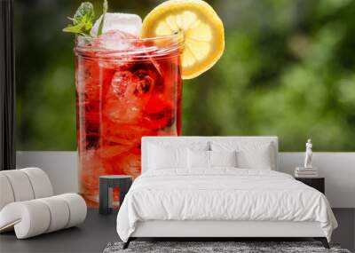 red drink with ice cubes Wall mural