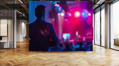 Blurry corporate event photo with a speaker on stage giving a presentation at a tech entrepreneur meeting copy space image Wall mural