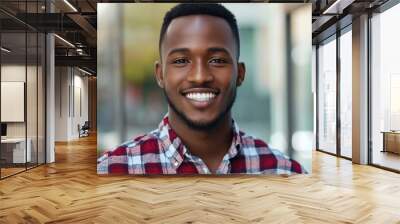 Smiling Young Man in Red Plaid Shirt Wall mural