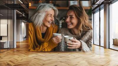 Two friends enjoying a morning cup of coffee together Wall mural