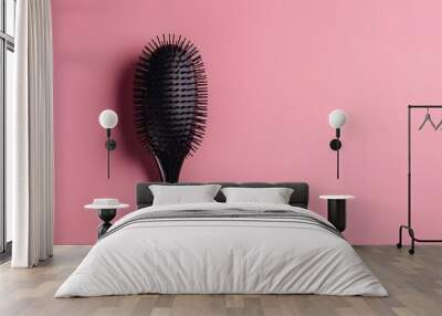 Electric hair brush isoalted on a pink background Wall mural