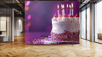 Fresh birthday cake sat on a table on purple background Wall mural