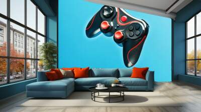 Game controller gamepad on blue background flying. Device to control and control the game. Wall mural