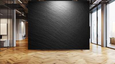 textured black slate background with spot of light Wall mural