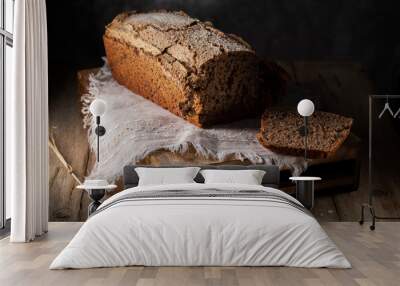 
Gray rye bread on a rustic table Wall mural