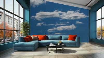 fluffy clouds on a sunny sky Wall mural