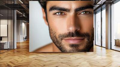 Man with a beard and blue eyes. He has a clean shave and a nice smile. He looks confident and well-groomed Wall mural