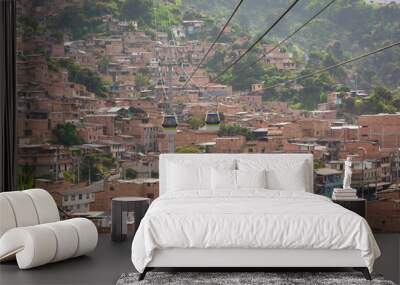 Medellin, Antioquia / Colombia. October 28, 2018. Line M of the Medellín Metro is a cable car line used as a medium-capacity mass transportation system. It was inaugurated on February 28, 2019. Wall mural