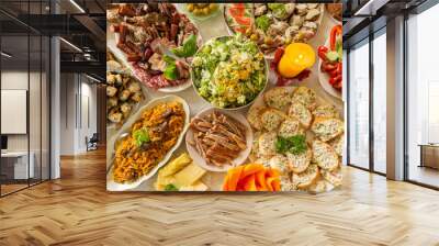 Table filled with snacks and traditional eastern European (Lithuanian) food for a feast celebration. Wall mural