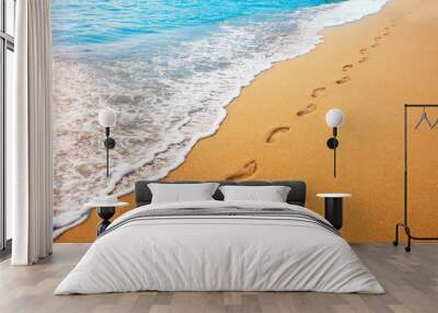 footprints on  tropical beach and beautiful  wave Wall mural