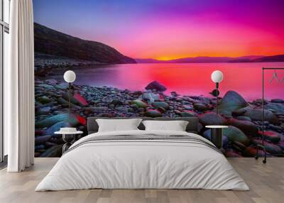 Sunset on the stone coast Wall mural