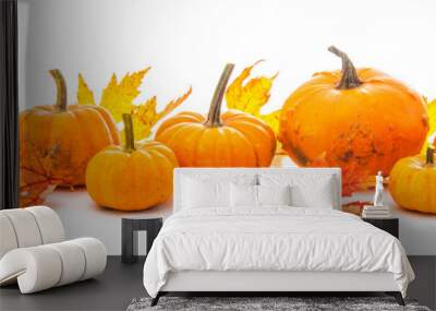 Autumn decoration arranged with dry leaves and pumpkins i Wall mural