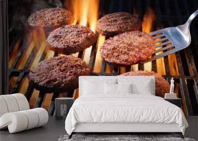 Beef hamburger patties sizzling on the barbecue Wall mural