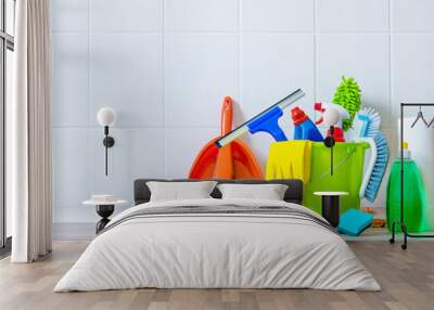 Bucket of cleaning supplies in the front of tiled wall Wall mural