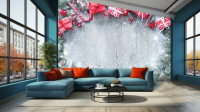 Christmas and New Year background with fir branches, gift boxes, ornament and snowfall Wall mural