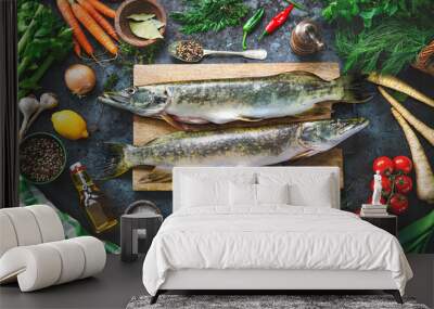 Fresh raw pike fishs and ingredients prepared for cooking Wall mural