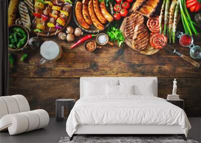 Grilled meat and vegetables on rustic wooden table Wall mural