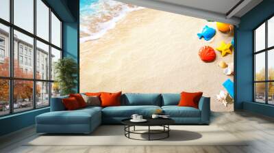 Ocean sand beach with sunbathing accessories Wall mural