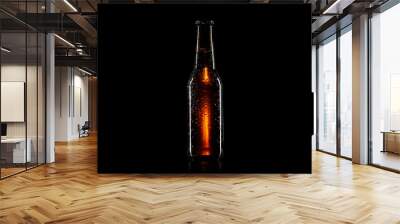 Small brown beer bottle with drops on black background
 Wall mural