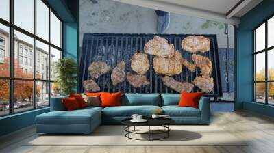 Smoke and flame barbecue. Grilling food. Close-up of meat steak cooked on the grill. Summer picnic in the park. Summer picnic concept. Grilled meat on fire. Barbecue outdoors. Wall mural