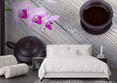 Chinese ceramic tea set on wooden table Wall mural