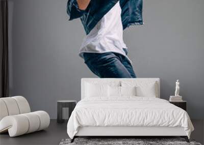 Young beautiful dancer posing in studio Wall mural