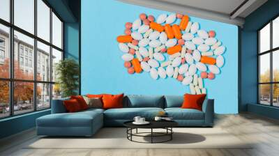 Different pills on a blue background. health and medicine. Brain Wall mural