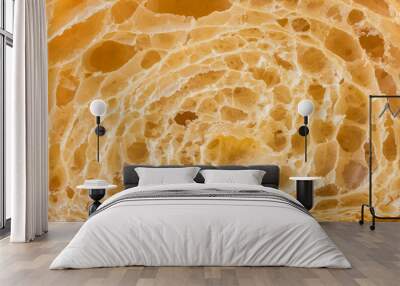 Macro shot of fresh croissant cut in a half. Baked croissant dough textured background Wall mural