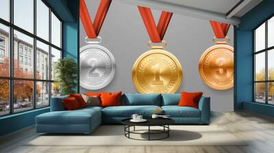 Vector Gold Silver and Bronze Award Medal hanging on a red ribbon. Olympic medal set. Symbol of success and victory. Realistic 3d style. Isolated on grey background. Wall mural