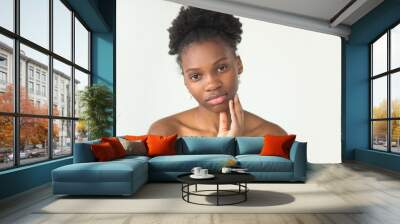 beautiful young african woman in towel on white background Wall mural