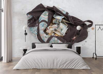 bag with russian money lying on the snow Wall mural