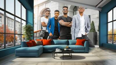 four handsome young african men on the background of the building Wall mural