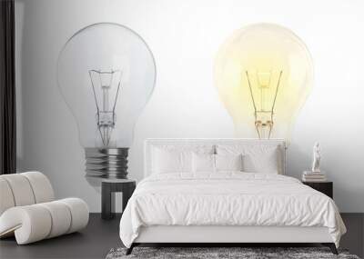 Glowing and turned off electric light bulb isolated on white Wall mural