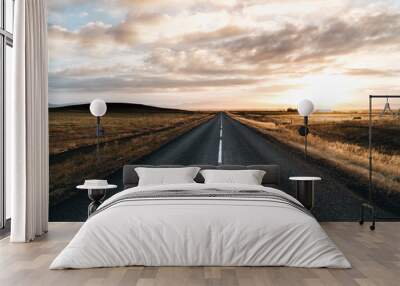 Never ending road till horizon on a sunrise sunset Wall mural