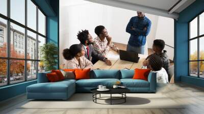 team of young african people at work in the office Wall mural