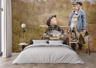 Portrait of a boy-racer with a mechanic Wall mural