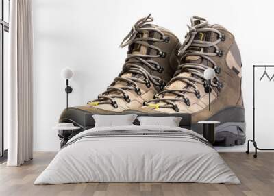 A pair of new hiking boots on white background Wall mural