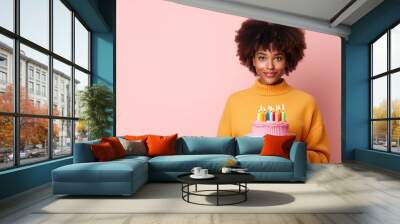 Beautiful african american woman with colorful cake celebrating birthday on pink background. Cheerful and happy face. Generative AI Wall mural