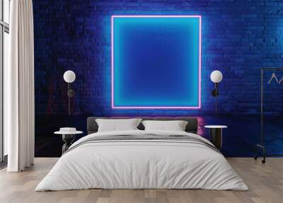 Blue neon sign glowing on a dark brick wall in an empty urban street at night, creating a vibrant and modern atmosphere Wall mural