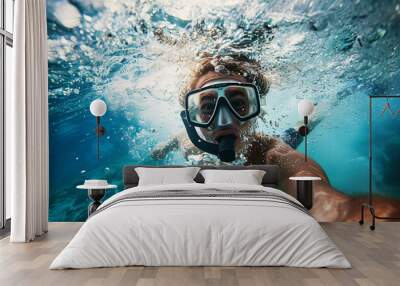 Capturing the thrill of underwater selfie adventure in clear oceanic waters while snorkeling and exploring marine life through aquatic sports and scuba diving Wall mural